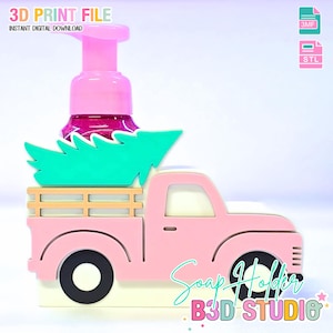 May include: A pink soap dispenser holder shaped like a vintage truck, with a green Christmas tree in the bed. The dispenser has a pink pump and a clear bottle with a pink liquid. Text on the image reads "3D PRINT FILE" and "Soap Holder B3D STUDIO".