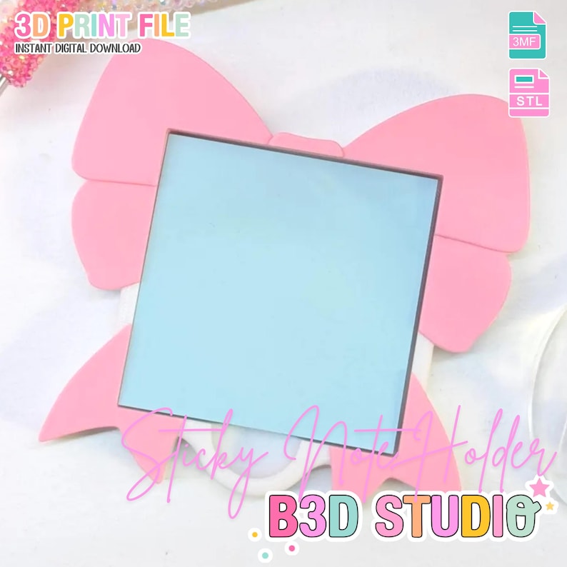 May include: A pink bow-shaped sticky note holder with a light blue square in the center. The text "3D PRINT FILE" and "INSTANT DIGITAL DOWNLOAD" are at the top. The text "Sticky Note Holder" and "B3D STUDIO" are at the bottom.