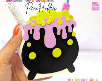 May include: A 3D printed pen holder shaped like a black cauldron with lime green bubbles and a light purple liquid dripping over the rim. The text B3D STUDIO Pen Holder is visible at the top, with 3MF and STL file icons and 3D PRINT FILE text.