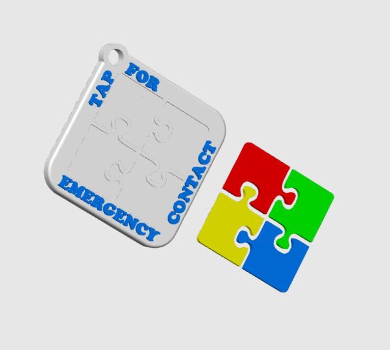 May include: A white puzzle-shaped keychain with blue text that reads "TAP FOR EMERGENCY CONTACT." A separate four-piece puzzle is in red, green, yellow, and blue. The keychain has a hole for attachment.