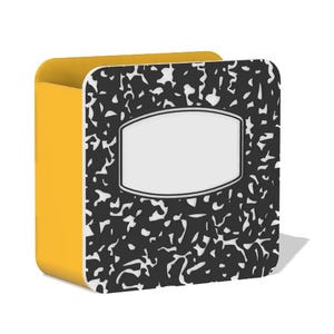 May include: A yellow and black composition notebook-style box. The front of the box has a black and white speckled pattern with a white label area. The sides of the box are solid yellow.