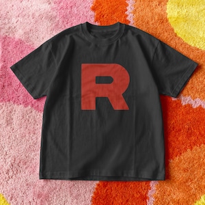 May include: A set of three ceramic nesting bowls in shades of blue, green, and white. The bowls feature a speckled glaze and a simple, modern design. The largest bowl is approximately 6 inches in diameter.