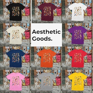 May include: A collage of ten t-shirts featuring a colorful bird pattern. The t-shirts are in various colors, including black, white, red, purple, blue, orange, pink, yellow, and gray. The text "Aesthetic Goods." is displayed in the center of the collage.
