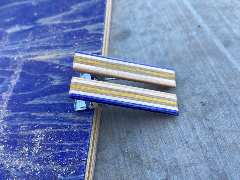 Blue and Yellow Alligator Hair Clips Made From Recycled Skateboard