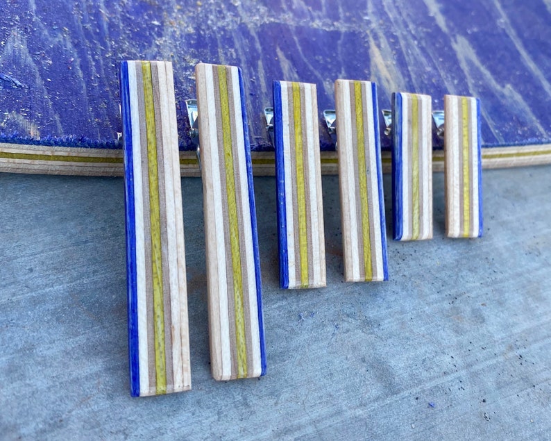 Blue and Yellow Alligator Hair Clips Made From Recycled Skateboard