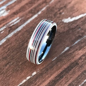 AAA grade Chrysler fordite ring with black ceramic inner liner