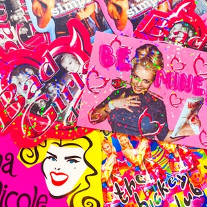 May include: A colourful collage of stickers and cards with a pop art style. The designs feature images of a woman, hearts, and text including "Be Mine" and "the hockey club". The colour palette includes pink, red, yellow, and blue.
