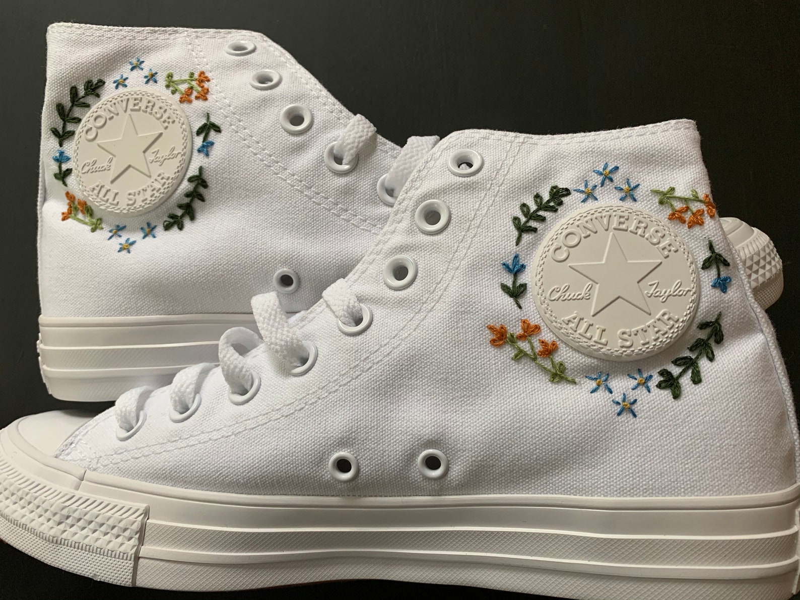 green embroidered converse