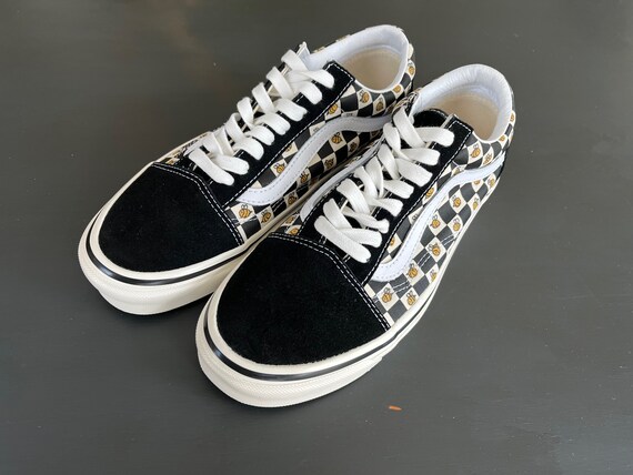 yellow checkered vans with flowers