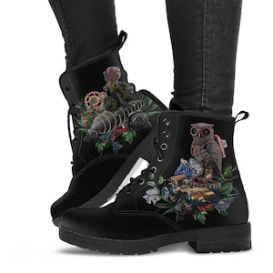 May include: Black leather boots with a steampunk design. One boot features an owl with goggles and a clockwork design, while the other boot features an octopus with gears and a bomb. Both boots have floral accents.