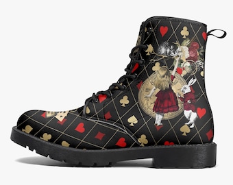 May include: A black lace-up boot featuring a gold diamond grid pattern with red hearts and gold clubs. The design includes a graphic illustration of a person in a red dress, a white rabbit in a red coat, a large clock face, and floral elements.