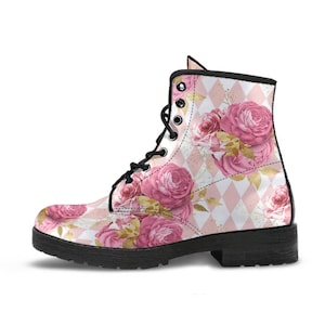 May include: A floral-patterned combat boot featuring a pink rose design on a white and pink diamond pattern. The boot has a black sole, black laces, and a black trim. The roses are accented with gold-colored leaves.