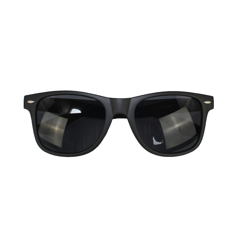 May include: Black plastic sunglasses with dark lenses.