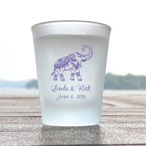 May include: A frosted glass shot glass with a purple elephant design and the text "Linda & Rick June 8, 2026".