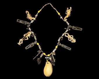 Original Charm Shaman/witch Doctor Necklace with beads/shell/teeth/wood and bone figures from Dayak Borneo