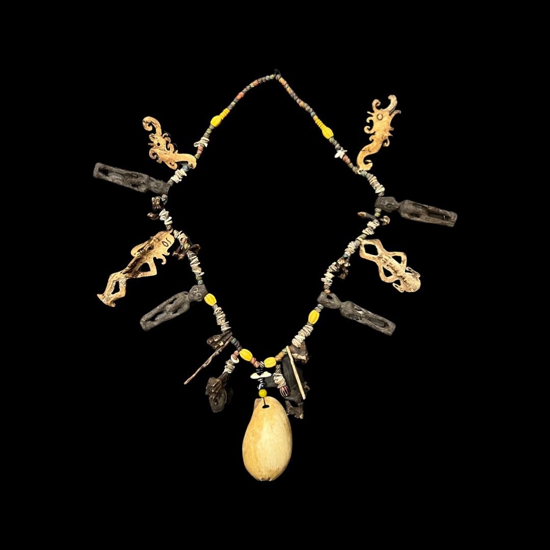 Original Charm Shaman/witch Doctor Necklace with beads/shell/teeth/wood and bone figures from Dayak Borneo