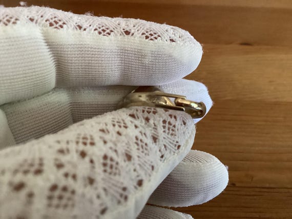 This ring features a large, iridescent "mystic to… - image 9