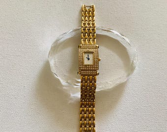 Vintage gold-tone crystal watch from the "Real Collectibles by Adrienne" collection.