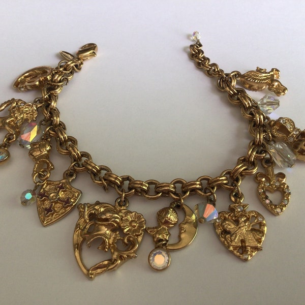 Kirks Folly Vintage Charms Armband.Gold Ton ,Strasssteine Aurora Borealis.