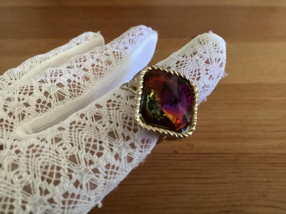 This ring features a large, iridescent "mystic to… - image 10