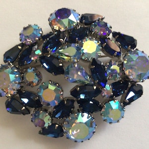 Vintage Brooch.Made in Austria.Silver tone.Rhinestone Aurora Borealis Blue Color