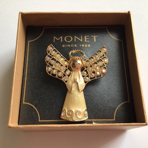 Monet Vintage Brooch.Gold plated,enamel Angel.Rhinestone Aurora Borealis. New in original box.Old stock.