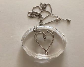 Colar Brighton "Whimsical" com pingente em formato de coração. Banhado a prata. Cristal transparente.