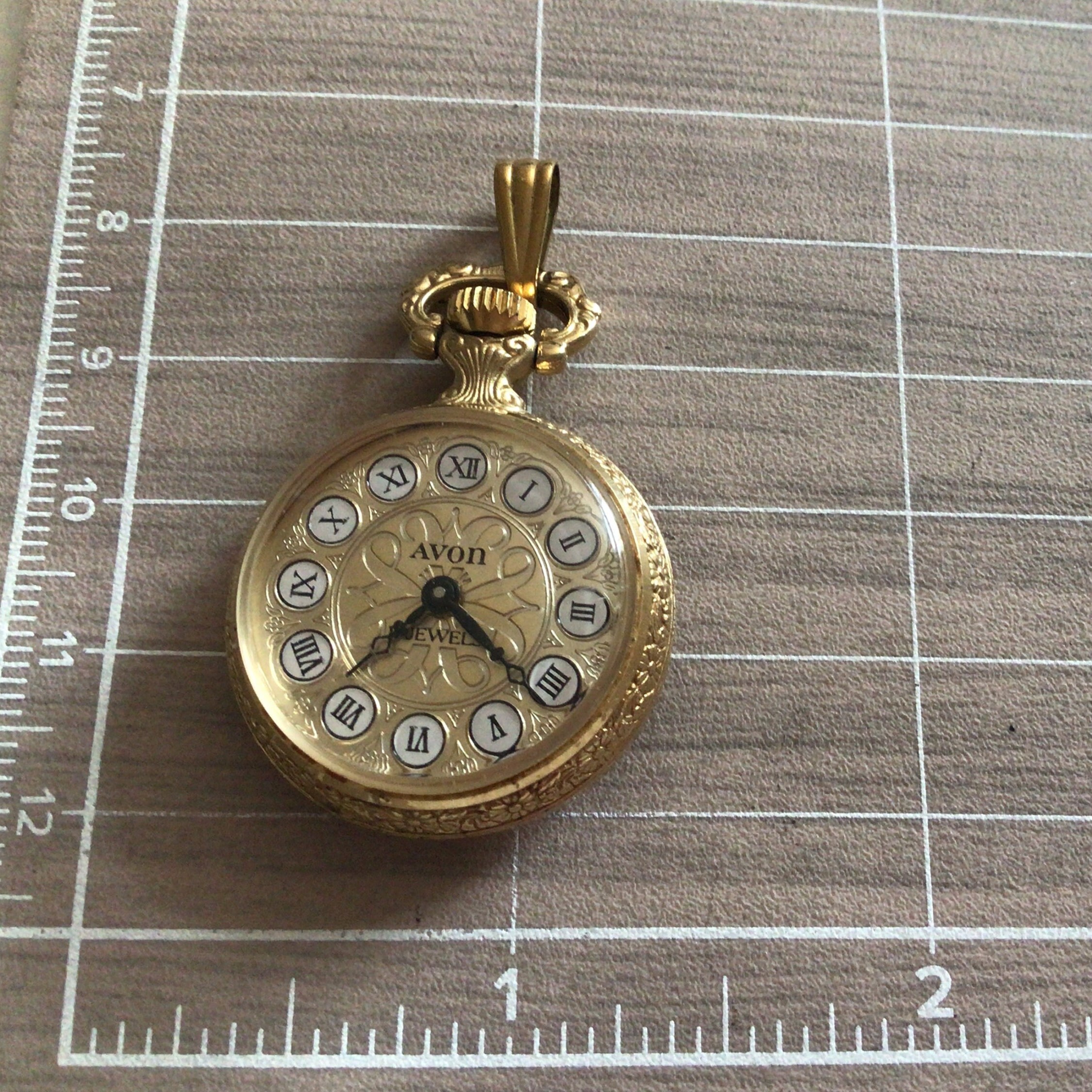 Avon pocket watch sales