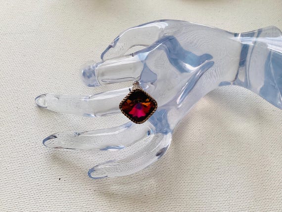 This ring features a large, iridescent "mystic to… - image 5