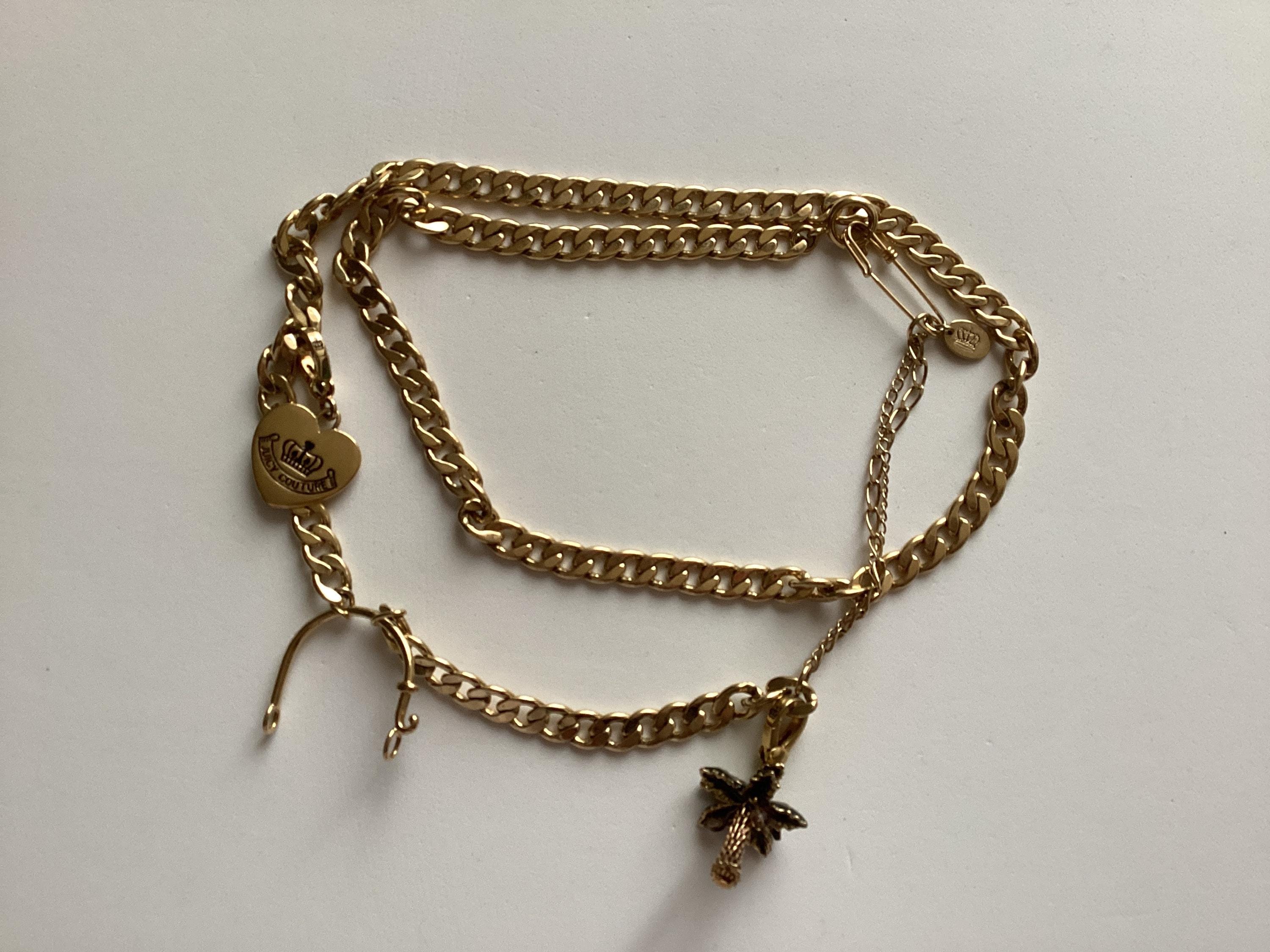 Vintage Juicy Couture Long Charms Gold tone chain.