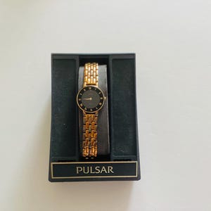Pilsar Quartz Diamond Accent Ladies Watch Black Goldtone Band WR221404  ew Battery