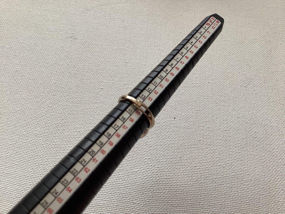 This ring features a large, iridescent "mystic to… - image 7