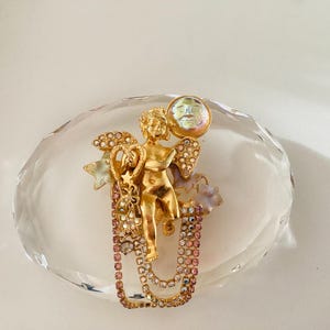 Vintage 1980’s Kirk’s Folly Gold Plated Crystal Enamel Cupid Brooch