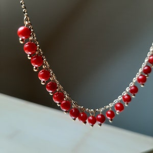 Gold necklace and Red Coral