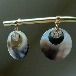 Shell and gold earrings