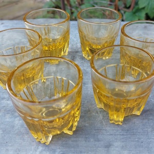 6 amber-colored liqueur glasses