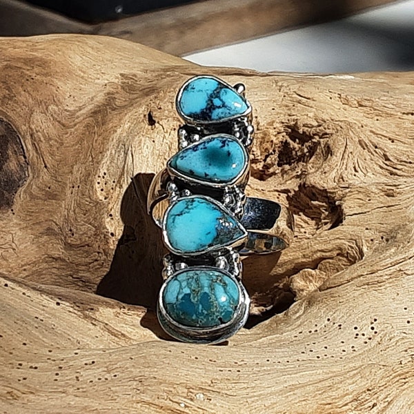 Long ring in 925 silver and turquoise, adjustable.