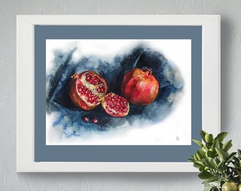 Red pomegranates on blue watercolor painting