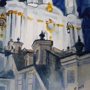 May include: Watercolor painting of a white building with gold accents and a blue sky. The building has a tall, pointed roof and many windows. The painting is signed "Murkova M. 2019".
