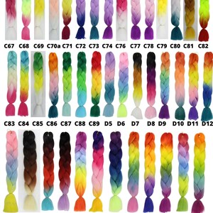 May include: A collection of 35 colorful ombre braiding hair extensions. Each braid features a gradient of colors, including pink, blue, green, yellow, orange, and purple. The braids are arranged in rows, with the numbers C67 through E5 printed below each braid.