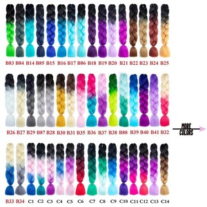 May include: A selection of 48 ombre braiding hair extensions in various colors. The hair is pre-braided and comes in a variety of shades, including pink, blue, green, yellow, and purple. The hair is arranged in rows, with each row labeled with a letter and number.