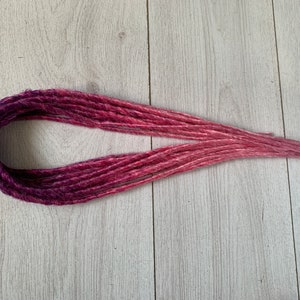 pink dreadlocks single ended dreads