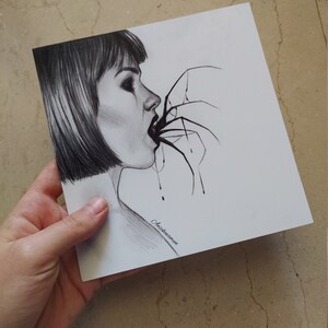 May include: A black and white pencil drawing of a woman with short hair, her mouth open with a spider's legs extending into it. The artwork is signed "Anskenamun".
