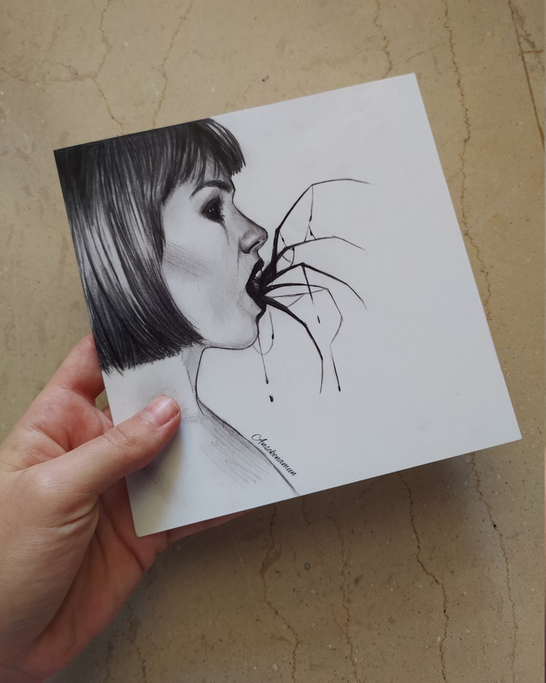 May include: A black and white pencil drawing of a woman with short hair, her mouth open with a spider's legs extending into it. The artwork is signed "Anskenamun".