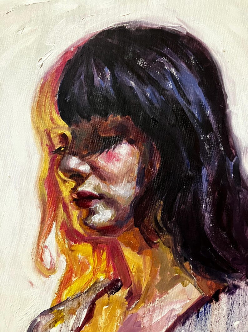 May include: Oil painting portrait of a person with dark hair and red lips. The artwork features a palette of colours including black, red, yellow, and white. The subject's face is partially illuminated, creating a contrast of light and shadow.