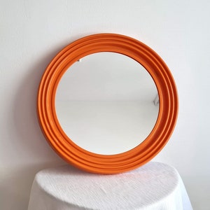 Vintage Pop art Memphis Milano style wall mirror in a plastic frame