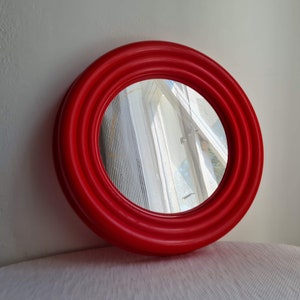 Vintage Pop art Memphis Milano style wall mirror in a plastic frame
