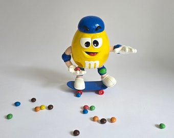 Vintage verzamelbare M&M's snoepdispenser geel