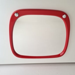Vintage Pop art Memphis Milano style wall mirror in a plastic frame