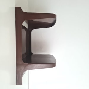Vintage Mid Century modern  wall shelf in a plastic 80s